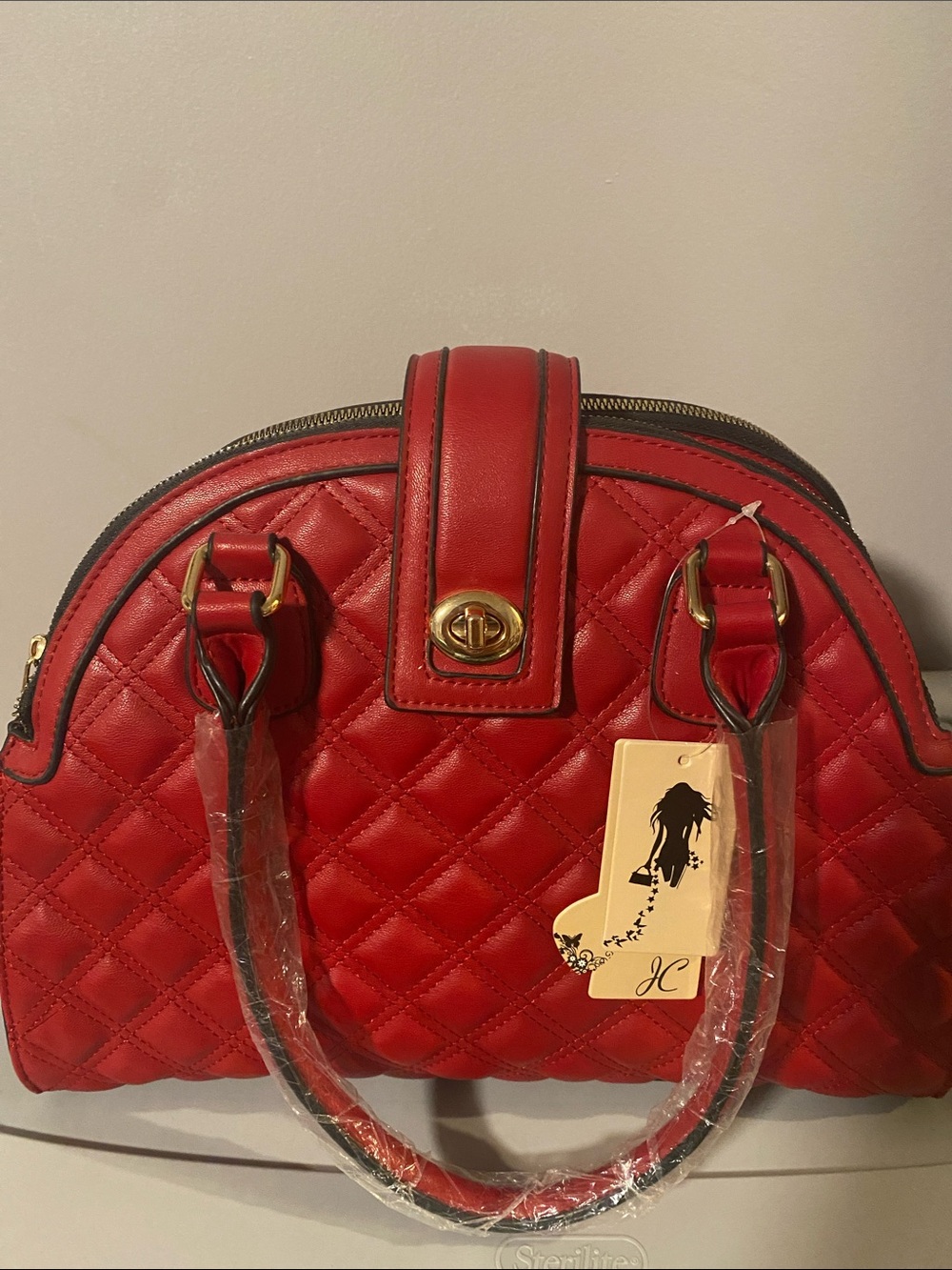 Red Quilted Dome Satchel with Gold Accent Hardware